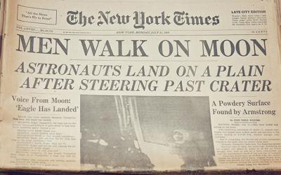 New York Times newspaper with Men Walk on Moon headline