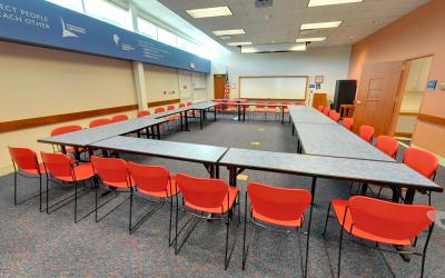 Tables and chairs set up inside the Northwest Library meeting room