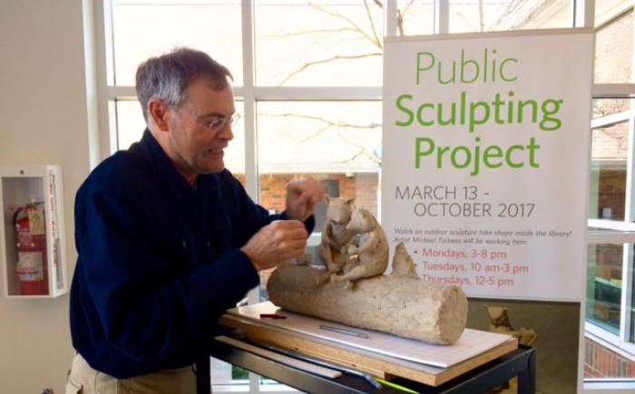 Sculptor Mike Tizzano working in the Old Worthington Library lobby