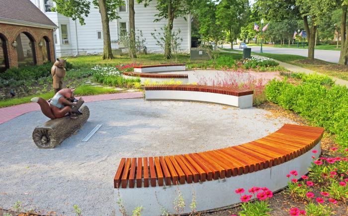 Seating surrounding the Reading with Friends sculpture
