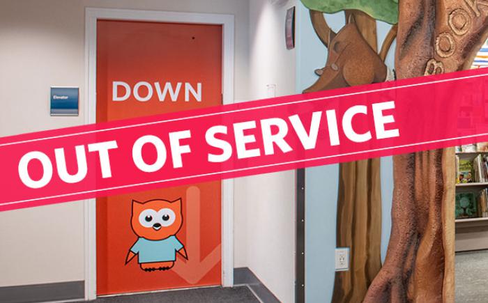 Old Worthington Library elevator with banner that reads Out of Service