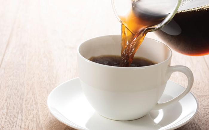 Coffee poured into a cup