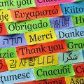 Colorful slips of paper with thank you written in many languages