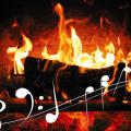 Music notes atop image of log burning in a fireplace