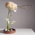 Floral material arranged using ikebana method