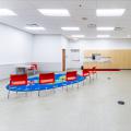 Chairs, rug and Smartboard inside meeting room