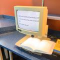Book text enlarged on closed circuit magnifier
