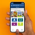 Hand holding smartphone with Worthington Libraries mobile app