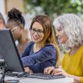 Two women at a computer