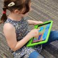 Child with an iPad