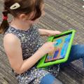 Child with an iPad