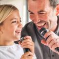 Child and adult with microphones