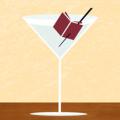A martini glass with a small book in it on the toothpick.