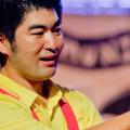 Yasu Ishida telling stories with an origami bird