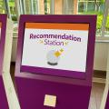 Recommendation Station kiosk screen with logo and crystal ball