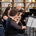 Musicians play instruments at Old Worthington Library