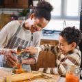 Woman and child baking in a kitchen