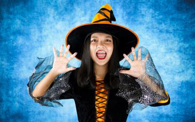 Young adult dressed as a witch