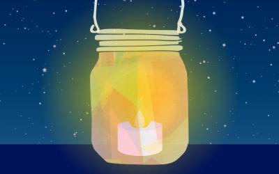 Canning jar holding a battery-powered candle