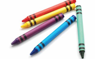 Red, yellow, purple, blue and green crayons