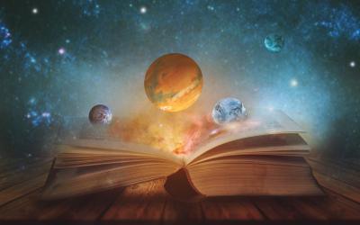 Thick book with planets floating above it against a space-y background