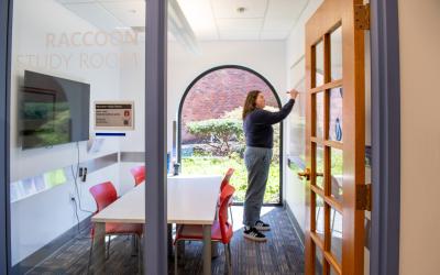 Looking into Raccoon Study Room with someone writing on a white board