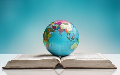 Globe on top of an open book
