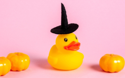 A rubber duck wearing a witch's hat