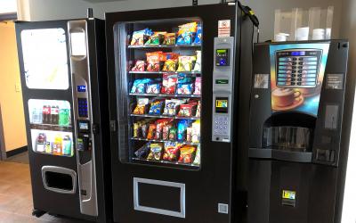 View of soda, snack and coffee vending machines