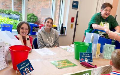Volunteens at summer reading club table