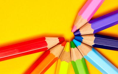 Colored pencils arranged in a half circle