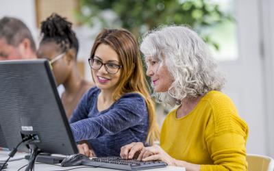 Two women at a computer