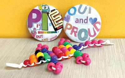 Pride themed buttons and crafts.