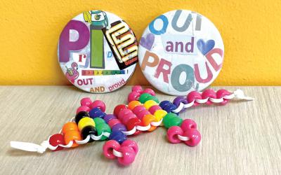 Pride themed buttons and crafts.