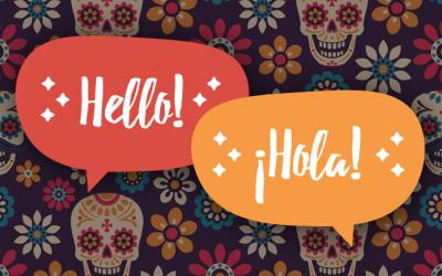 The words Hello and Hola in speech bubbles