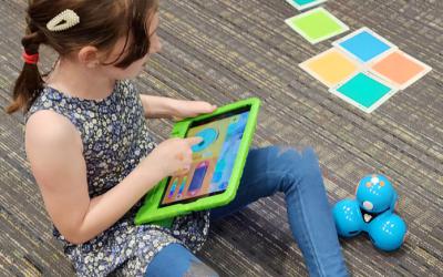 Child with an iPad