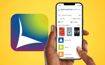 Hand holding smartphone with Worthington Libraries mobile app