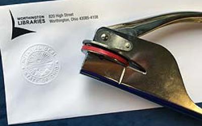 Notary embosser