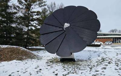 Smartflower solar panels in front of Northwest Library with snow on the ground