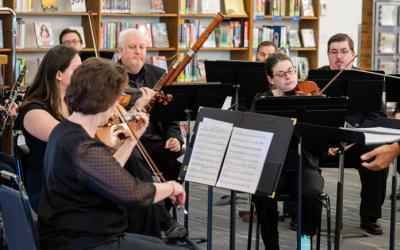 Musicians play instruments at Old Worthington Library