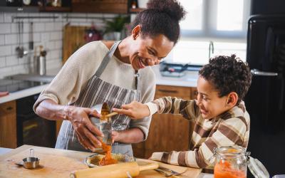 Woman and child baking in a kitchen