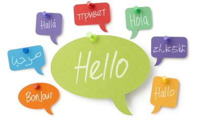 Large speech bubble reading Hello surrounded by smaller speech bubbles with the word hello in different languages
